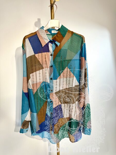 Damenbluse mit Glitzerpartikeln