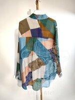 Damenbluse mit Glitzerpartikeln